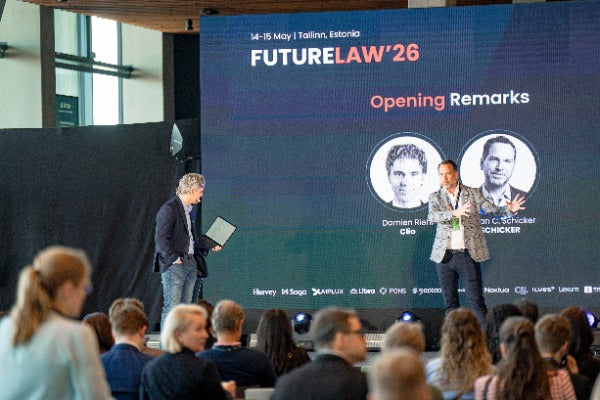 Valentin Feklistov speaks on stage at FutureLaw 2026.