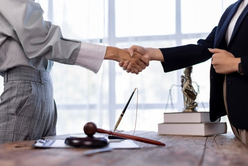 Hogan Lovells and Cadwalader in merger talks.