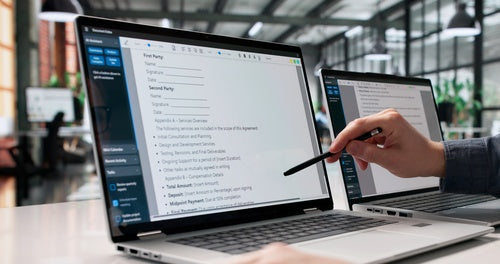 Attorney reviewing AI-generated case qualification results on a laptop. 